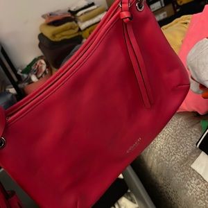 Coach small handbag with tassels on one side